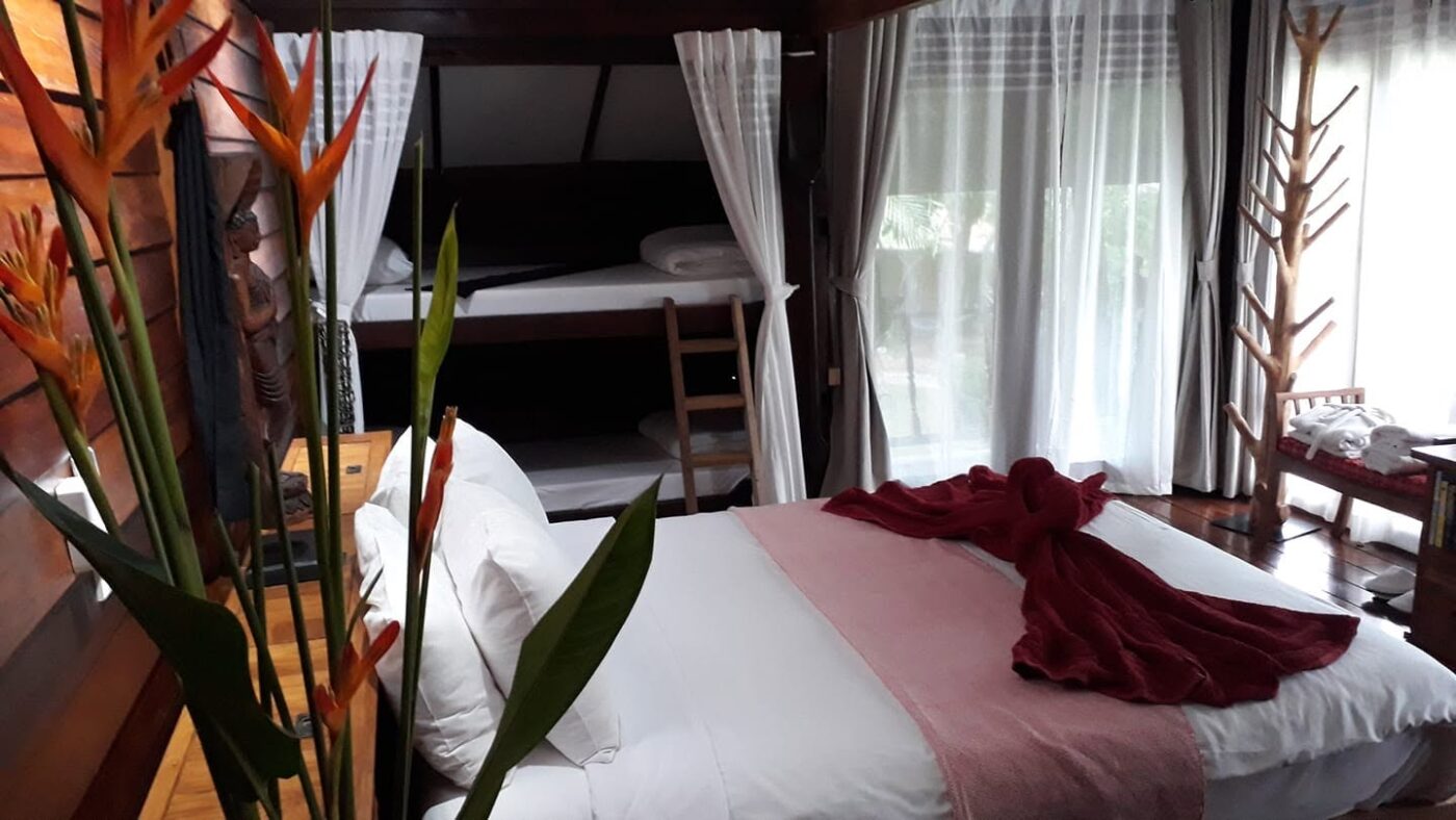 Simple wooden guest room at Rice Barn and Rooms in Chiang Mai